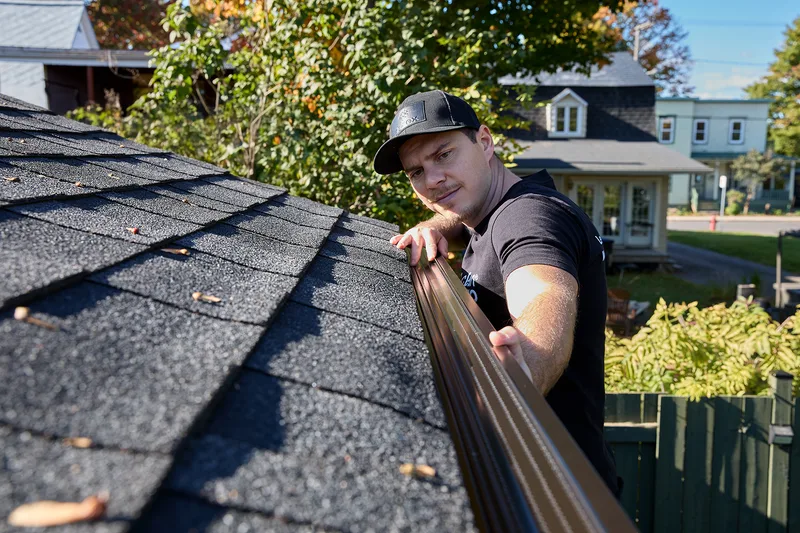 Seamless gutter installation prep on a Metro Vancouver home